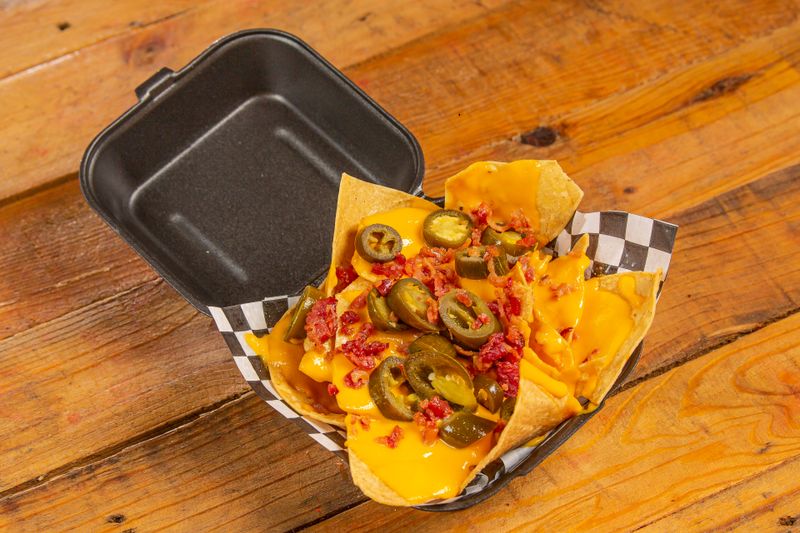 Nachos loaded with beans cheese and jalapeños